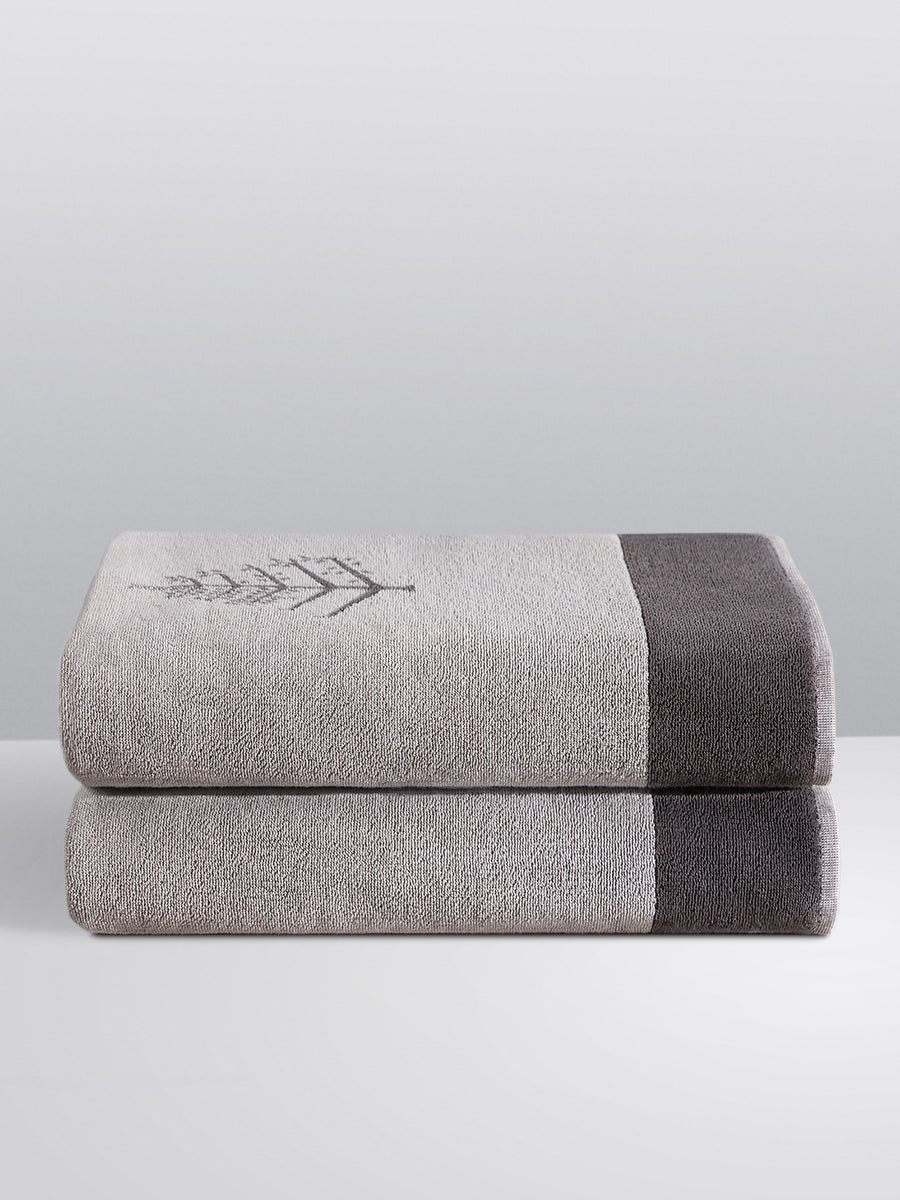 Four Seasons Resort Towel Set, grey and white grand-sized towels, sustainable cotton, signature embroidered design