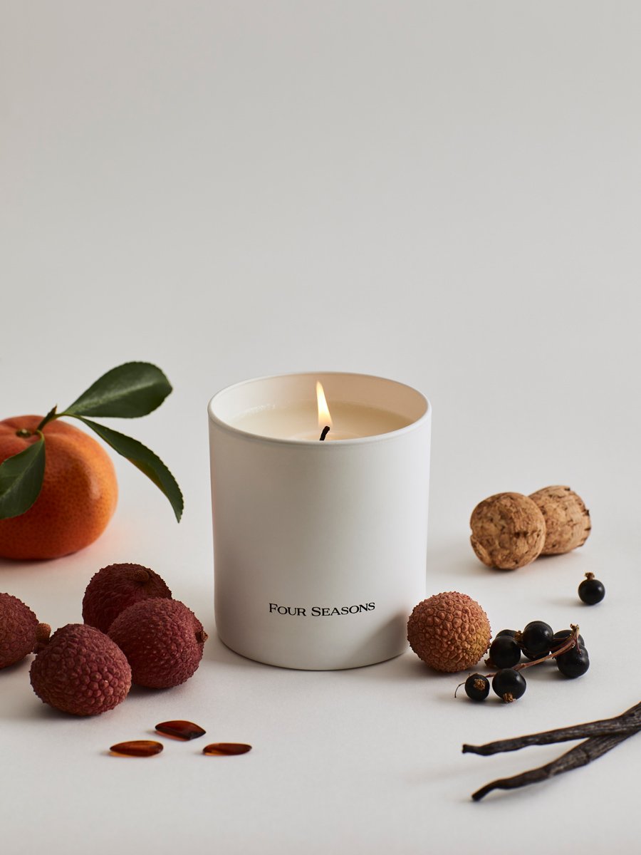 Four Seasons Signature Votive, Champagne Wonderland scent, white candle, luxury home accessory, citrus and floral notes